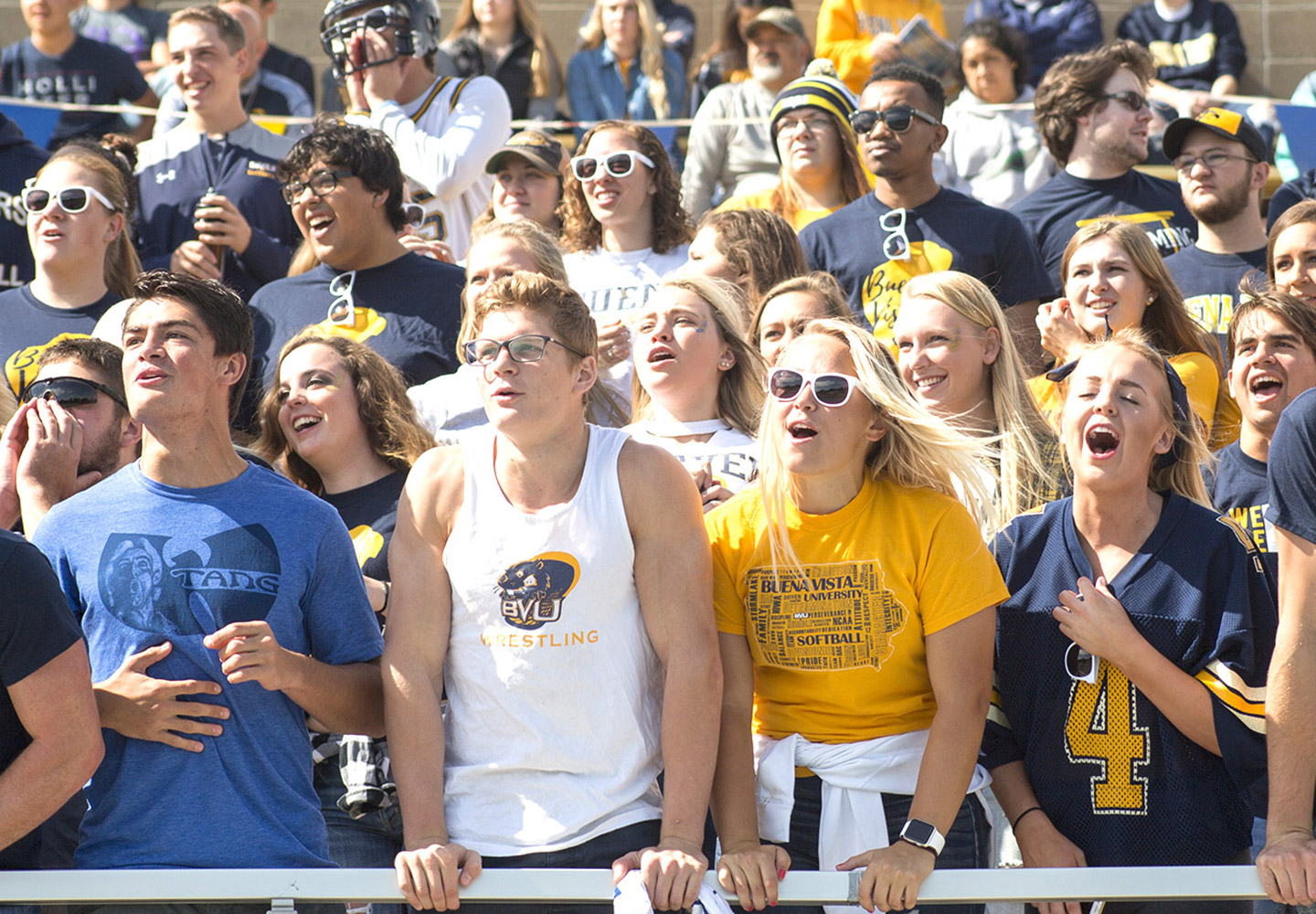 A group of happy students and alumni